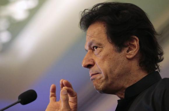 Khan, chairman of Pakistan Tehreek-e-Insaf (PTI) political party, speaks during a news conference in Islamabad