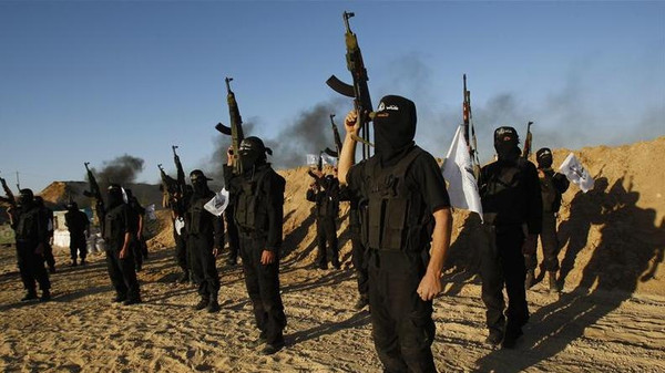 Palestinian militants from Al-Ansar brigade take part in a training session in Khan Younis in the southern Gaza Strip