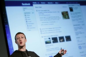 102457_facebook-ceo-zuckerberg-gestures-while-speaking-to-the-audience-during-a-media-event-at-facebook-headquarters-in-menlo-park