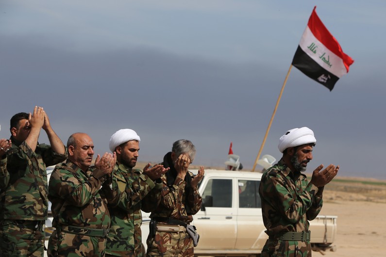 des-membres-d-une-milice-chiite-en-irak-le-8-mars-2015