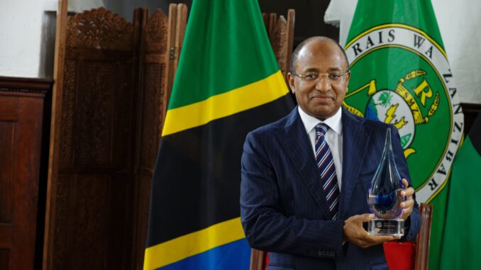 66505d254715cbb8432b59b4_Dr. mwinyi display his awards